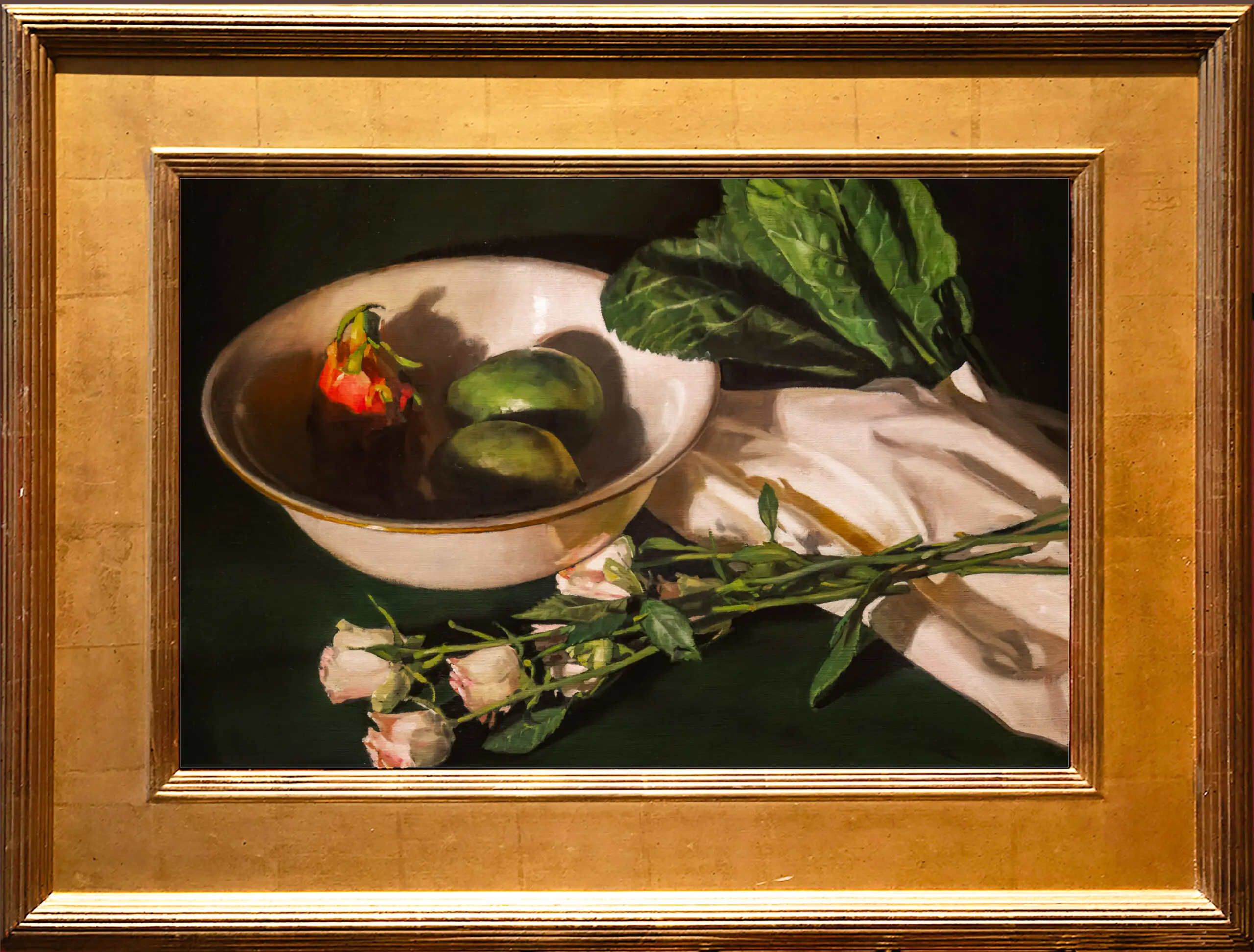 Still life of green lettuce and fruit and vegetables in a bowl