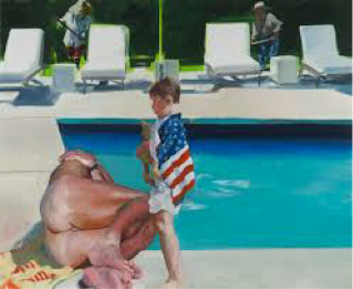 Nude man laying on concrete next to a pool, talkign to his young son who is wearing a swimsuit and USA flag