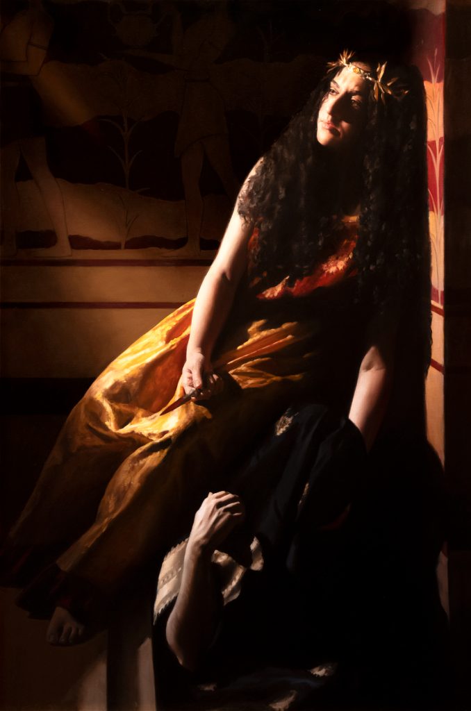 Woman with long black curly hair wearing a red and gold robe and holding onto a black robe with an arm hanging out of it