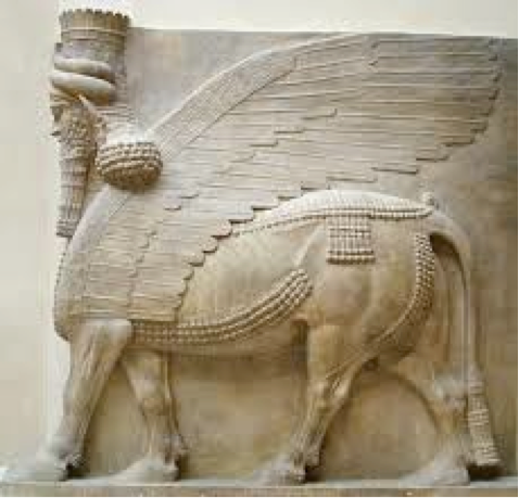 Assyrian sculpture of cow statue with wings and head of a man